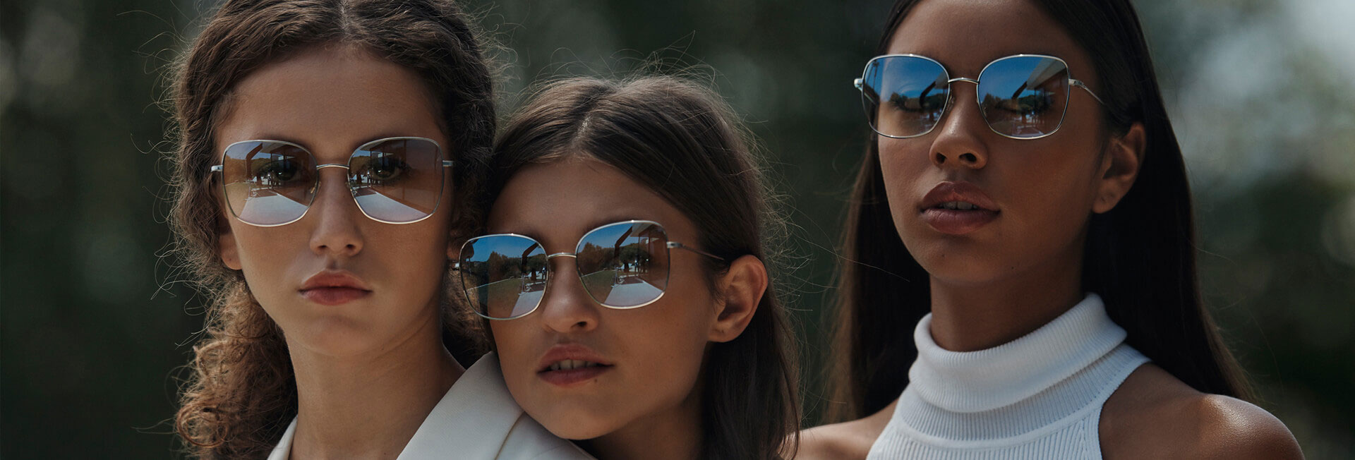 group of white females modeling sunwear