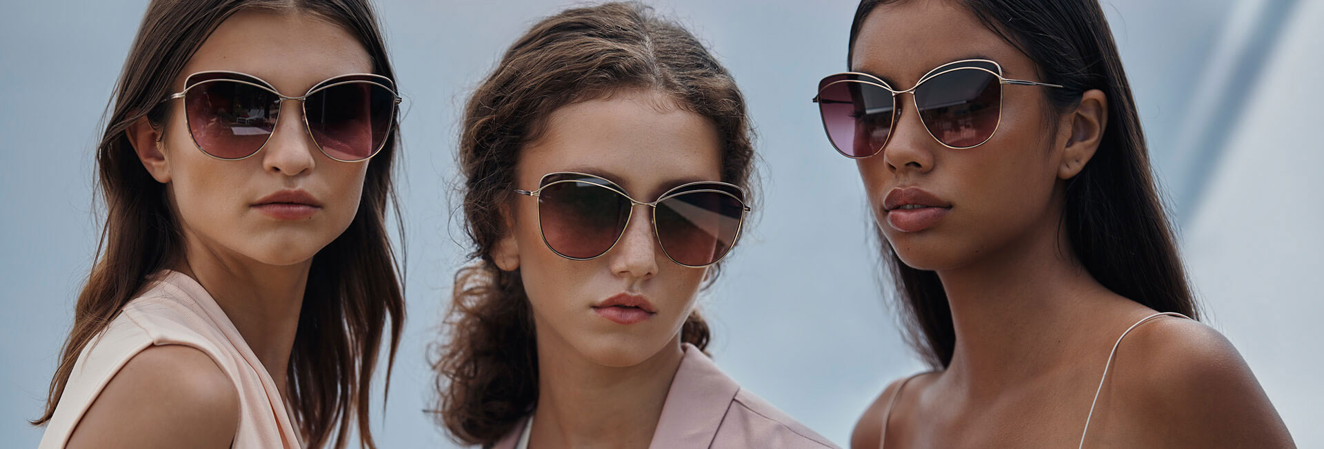 group of white females modeling sunwear